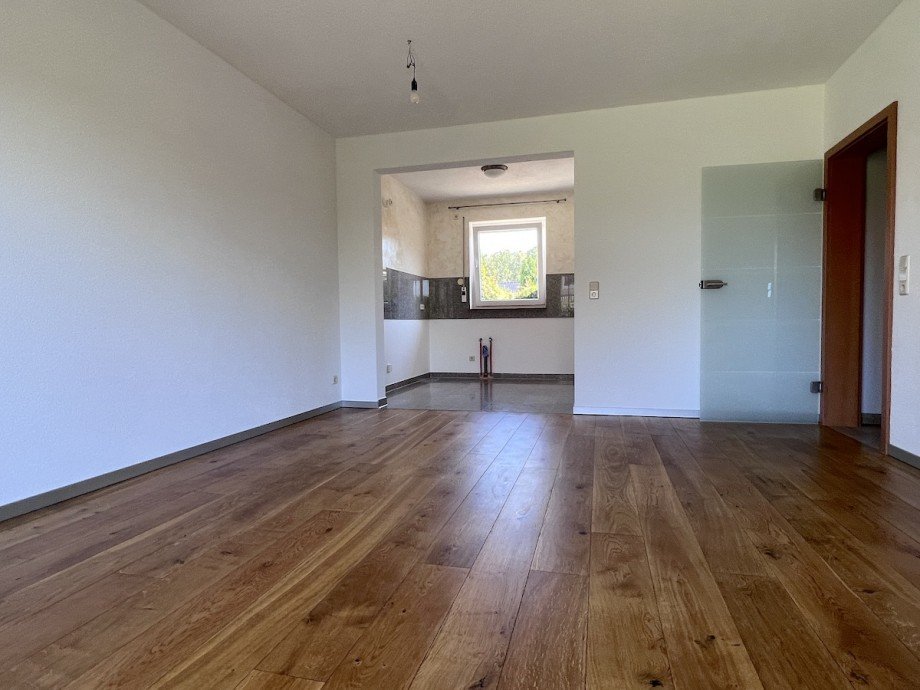 Wohnzimmer mit Blick zur K�che Terrassenwohnung Naunhof